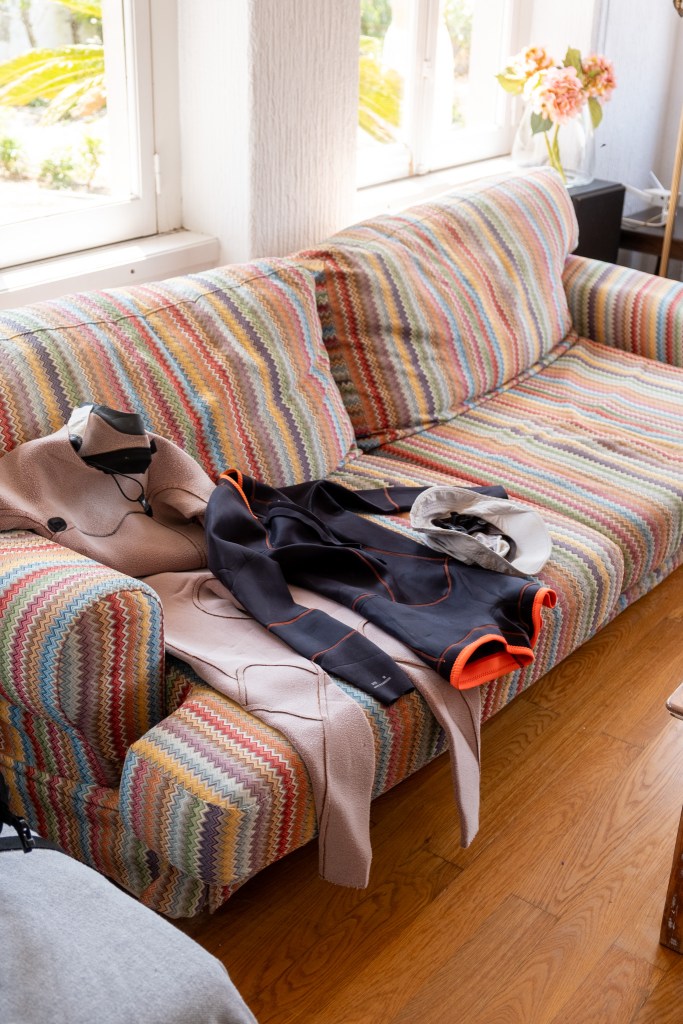 Wetsuit placed on couch